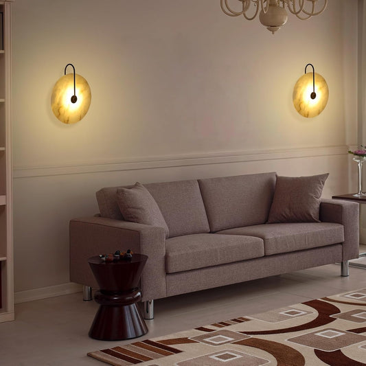 two marble wall lights above a sofa