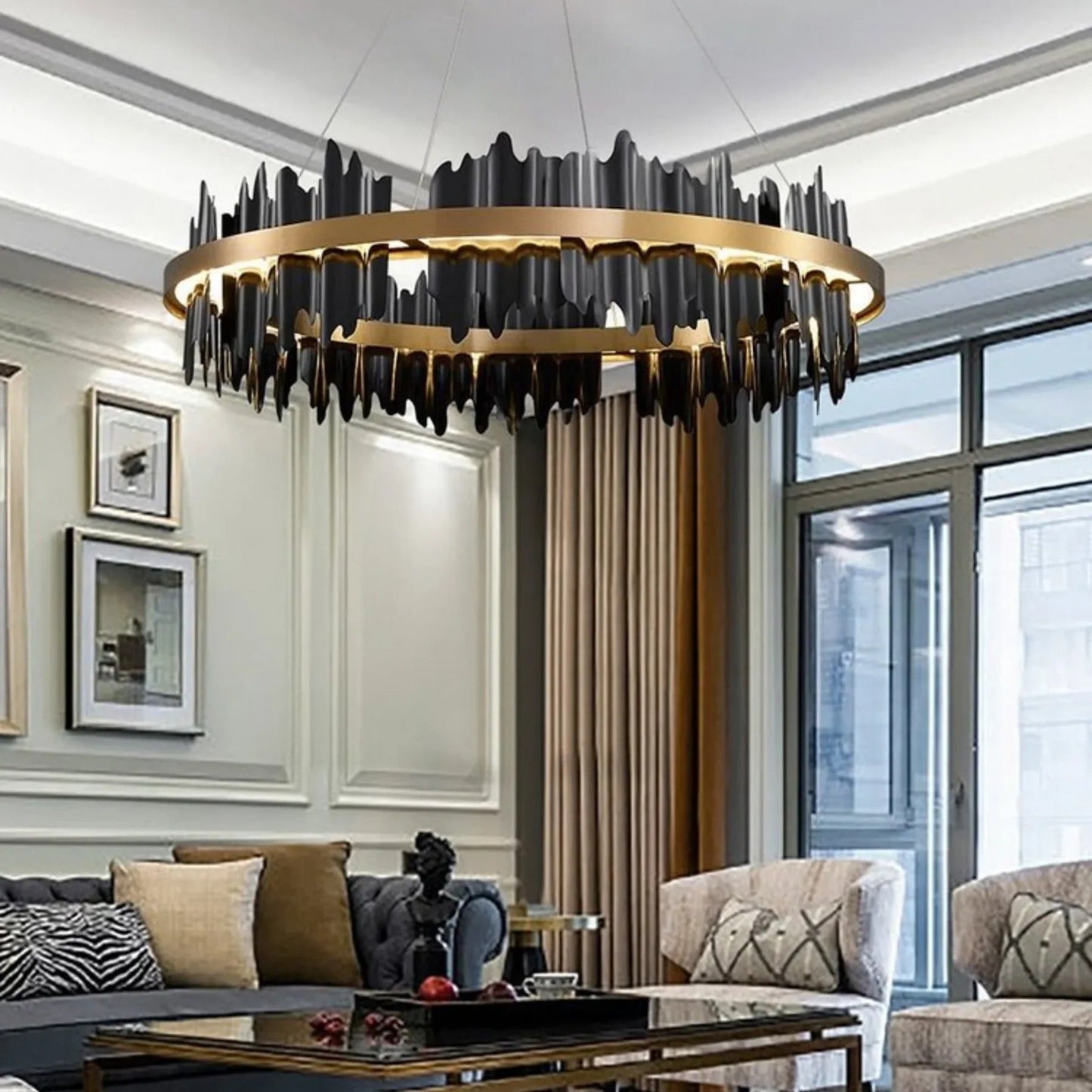Luxury chandelier in a modern living room with decor elements.