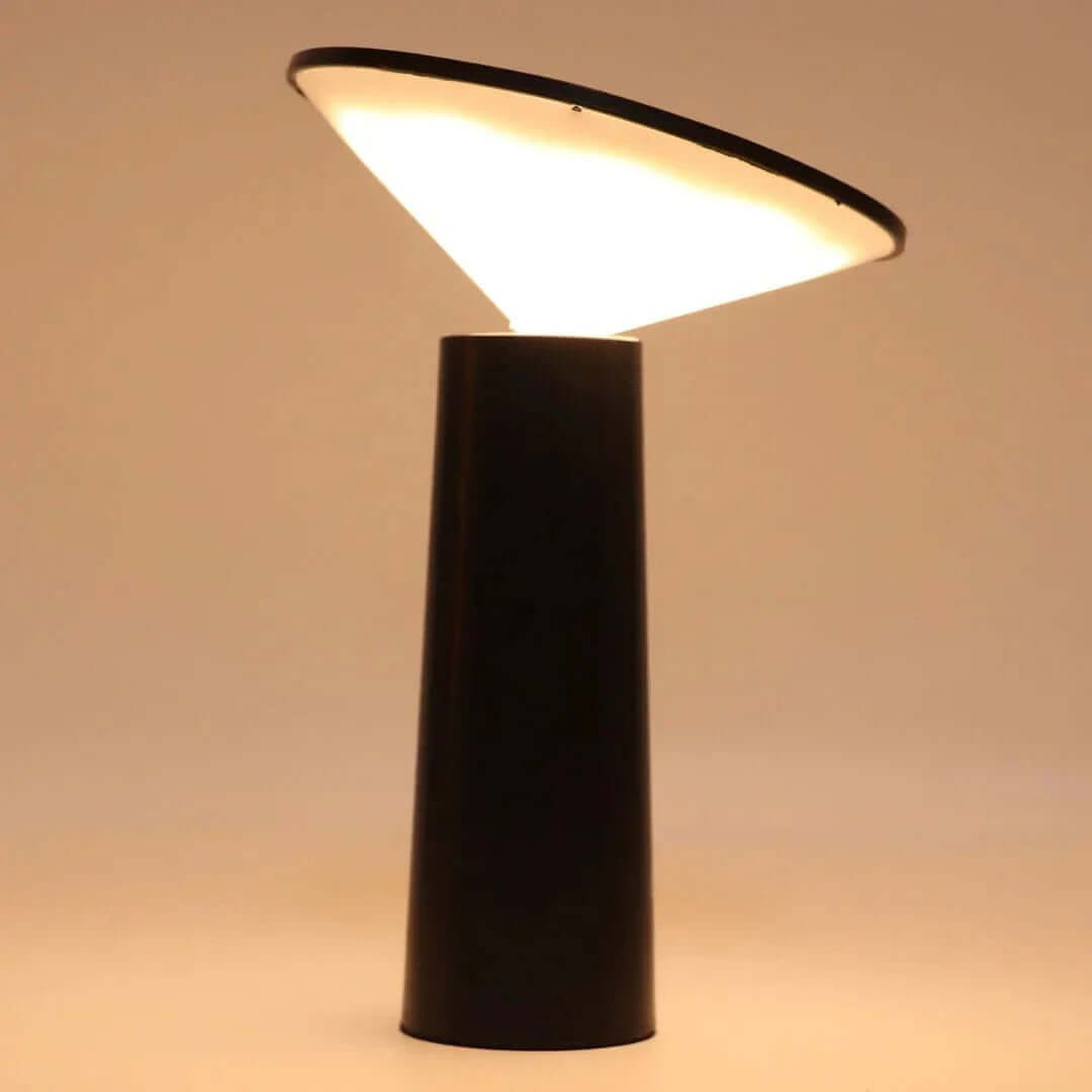 Rivo Cordless Table Lamp showcasing modern sculptural design with adjustable head for ambient lighting.