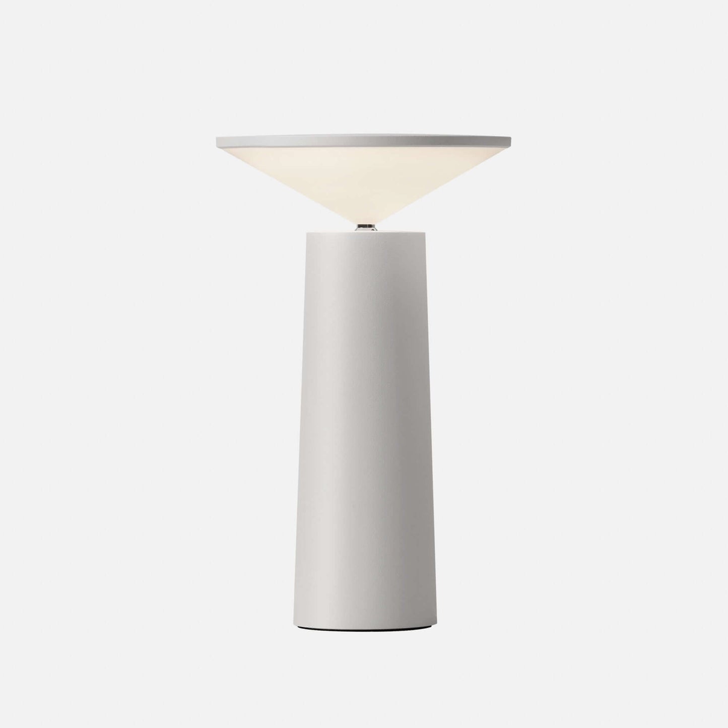 Rivo Cordless Table Lamp showcasing modern sculptural design, ideal for ambient lighting in any space.