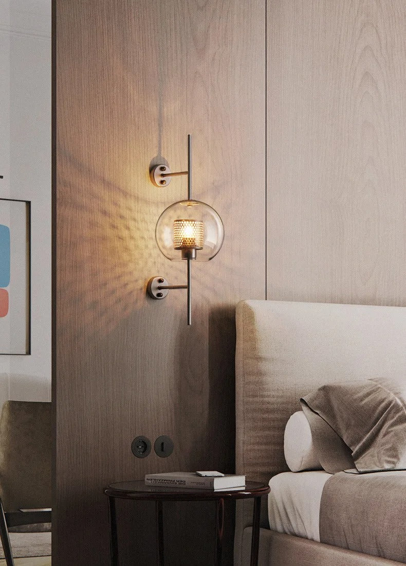 Modern bedroom with wall-mounted lamp and bed