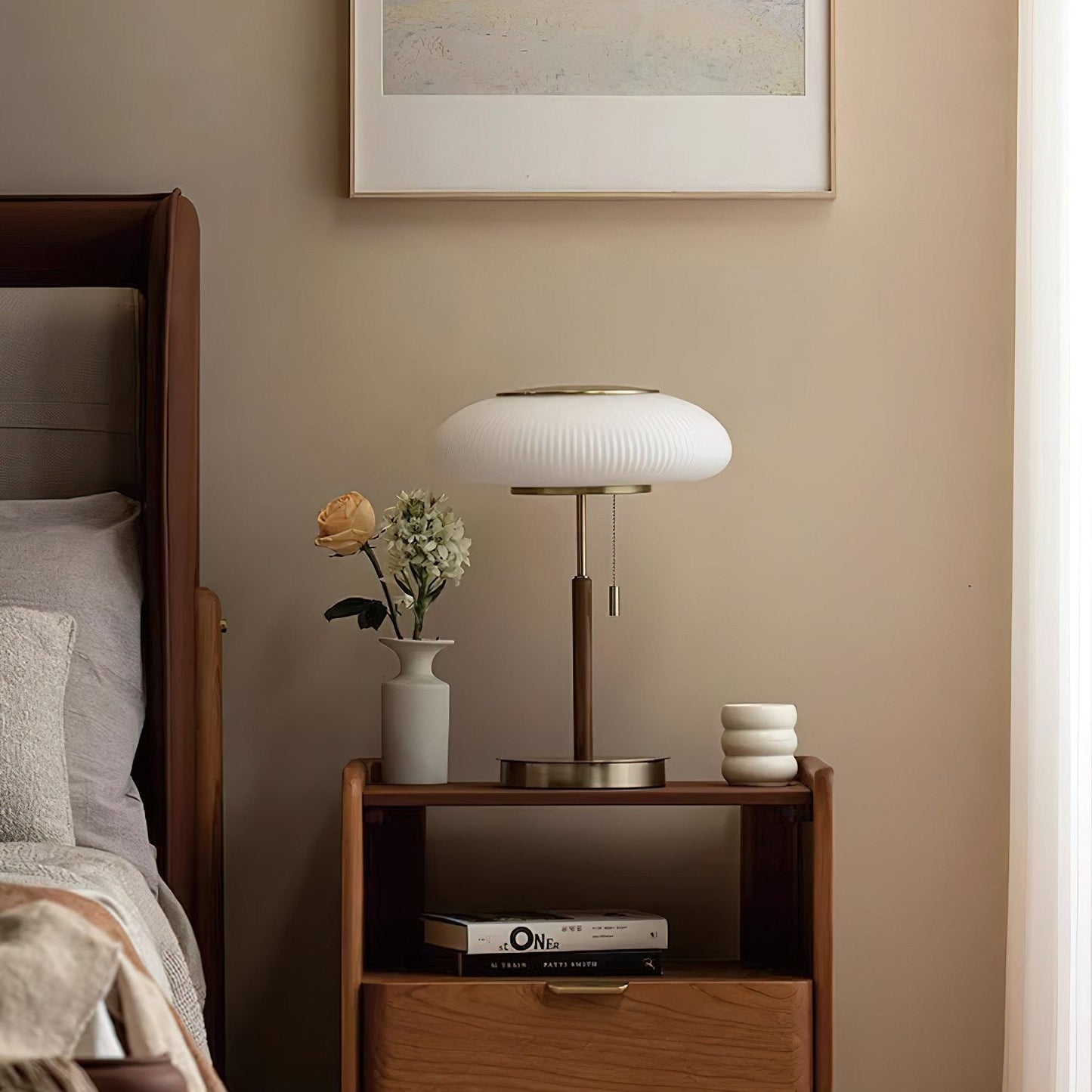 Matsutake Bloom Table Lamp – Elegant Table Lighting on bedside table with flowers and decorative items.