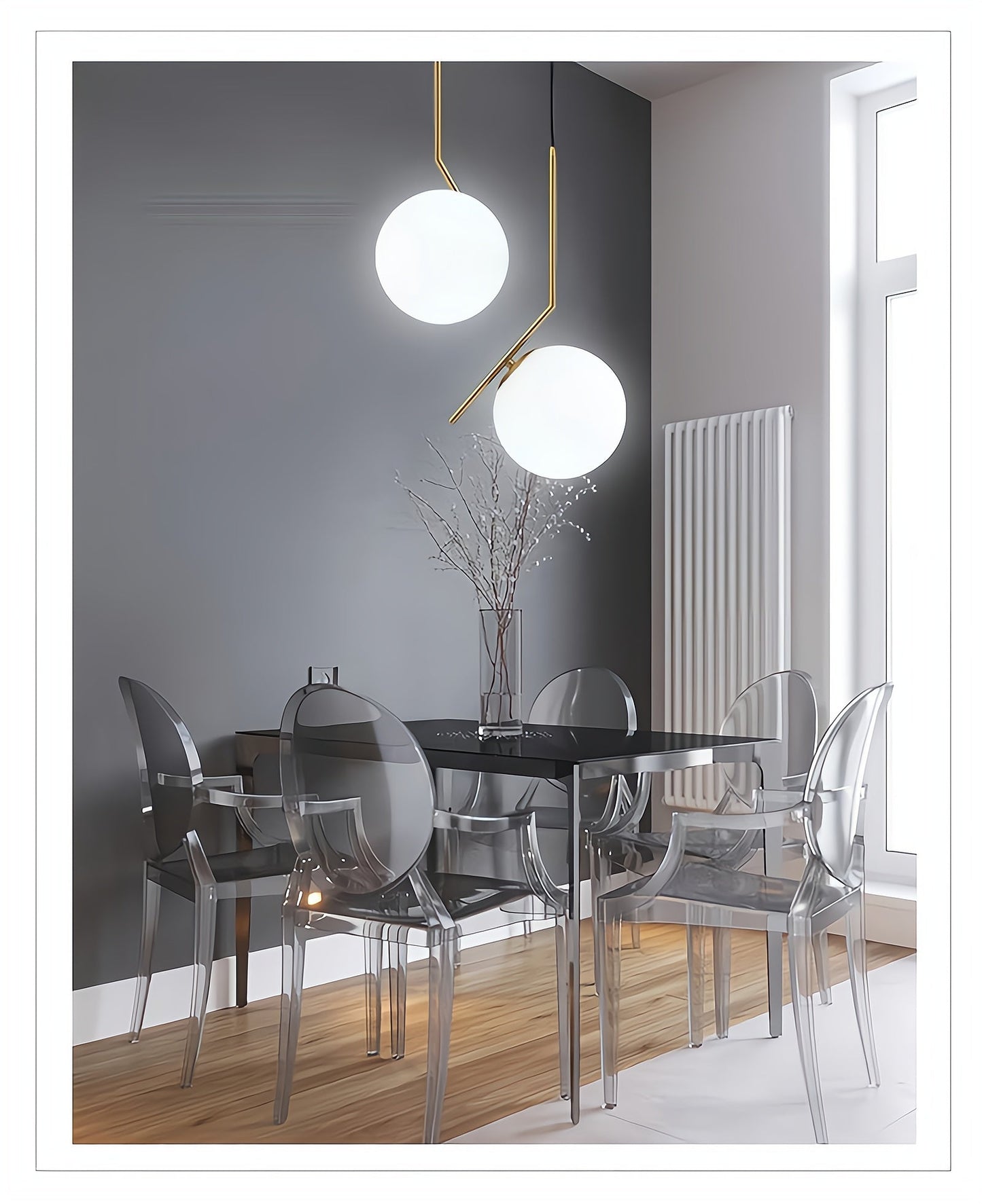 Modern dining room with black table and transparent chairs, featuring two pendant lights.