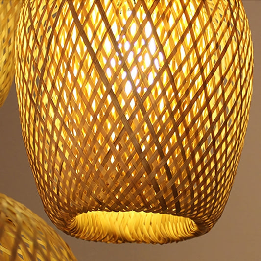 Woven bamboo lampshade with a warm glow on a neutral background