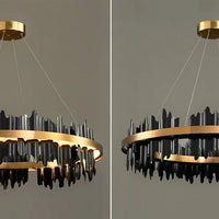 Chandelier with gold and black design on a gray background