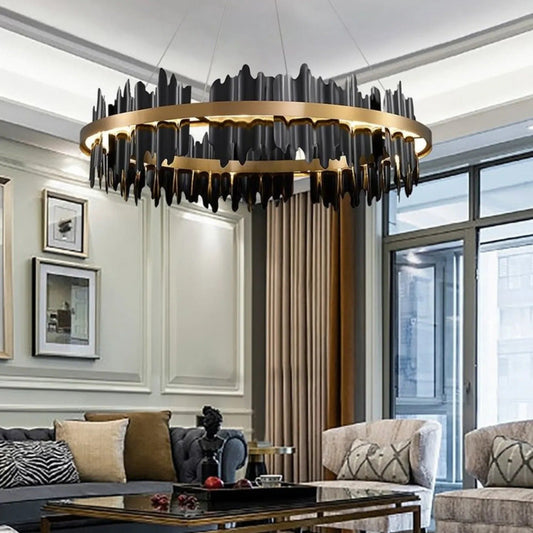 Luxury chandelier in a modern living room with decor elements.