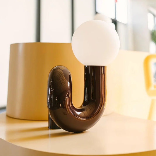 Curvia Neotenic Table Lamp – Playful Modern Lighting