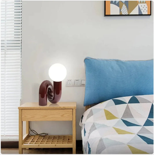 Curvia Neotenic Table Lamp – Playful Modern Lighting