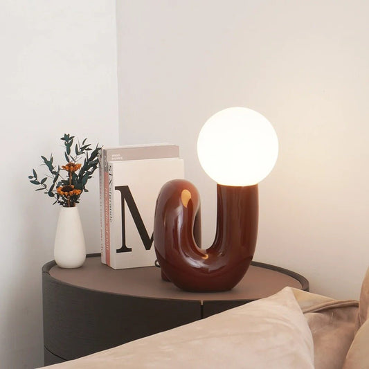 Curvia Neotenic Table Lamp – Playful Modern Lighting