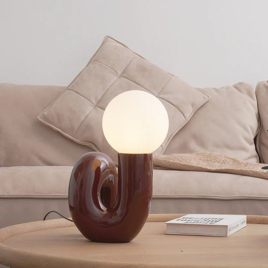 Curvia Neotenic Table Lamp – Playful Modern Lighting