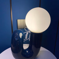 Curvia Neotenic Table Lamp – Playful Modern Lighting