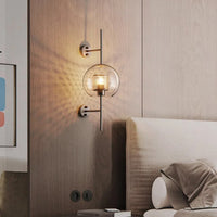 Modern bedroom with wall-mounted lamp and bed