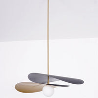Olivia Pendant Light with frosted glass globe and modern brass finish 