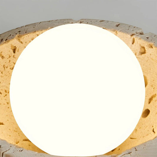 Close-up of a concrete block with a circular hole